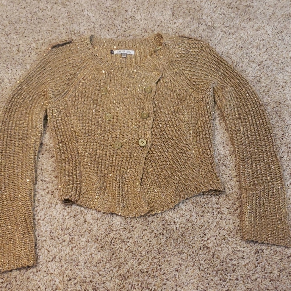 Gold Jennifer Lopez sweater
